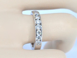 Witgouden half alliance ring met diamant