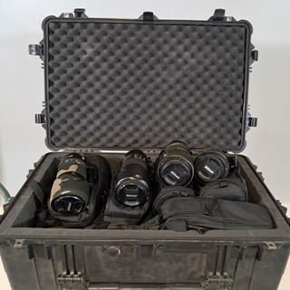 Diverse camera lenzen in koffer