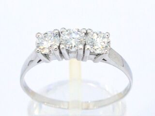 Gouden trinity ring met diamanten