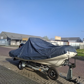 Dekkleed voor rib met gewicht in het zeil