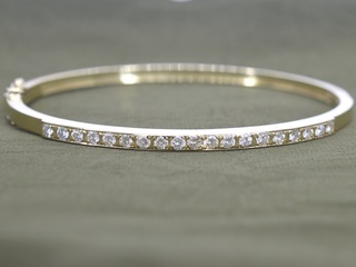 Gouden vaste armband met briljant geslepen diamanten