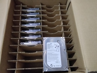 Doos met 8 Seagate Harde schrijven,320 GB Seagate