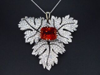 Witgouden hanger met diamanten en edelsteen spessartien van 13 carat