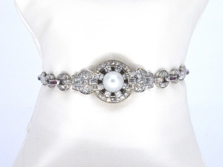 Art-Deco armband met goud en platina, en natuurlijke diamanten en robi