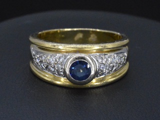 Gouden ring met diamanten en saffier