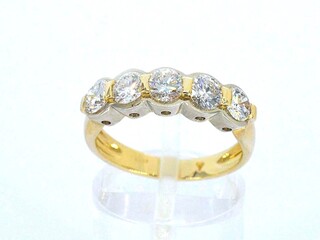 Gouden rij ring met 5 diamanten