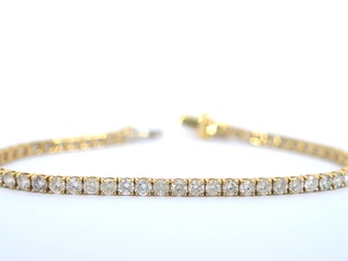 Gouden tennisarmband met natuurlijke briljant geslepen diamanten