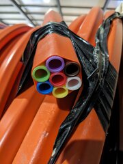 9x rol a 750 meter Kabelhaspel met glasvezel beschermbuis Microfocus,