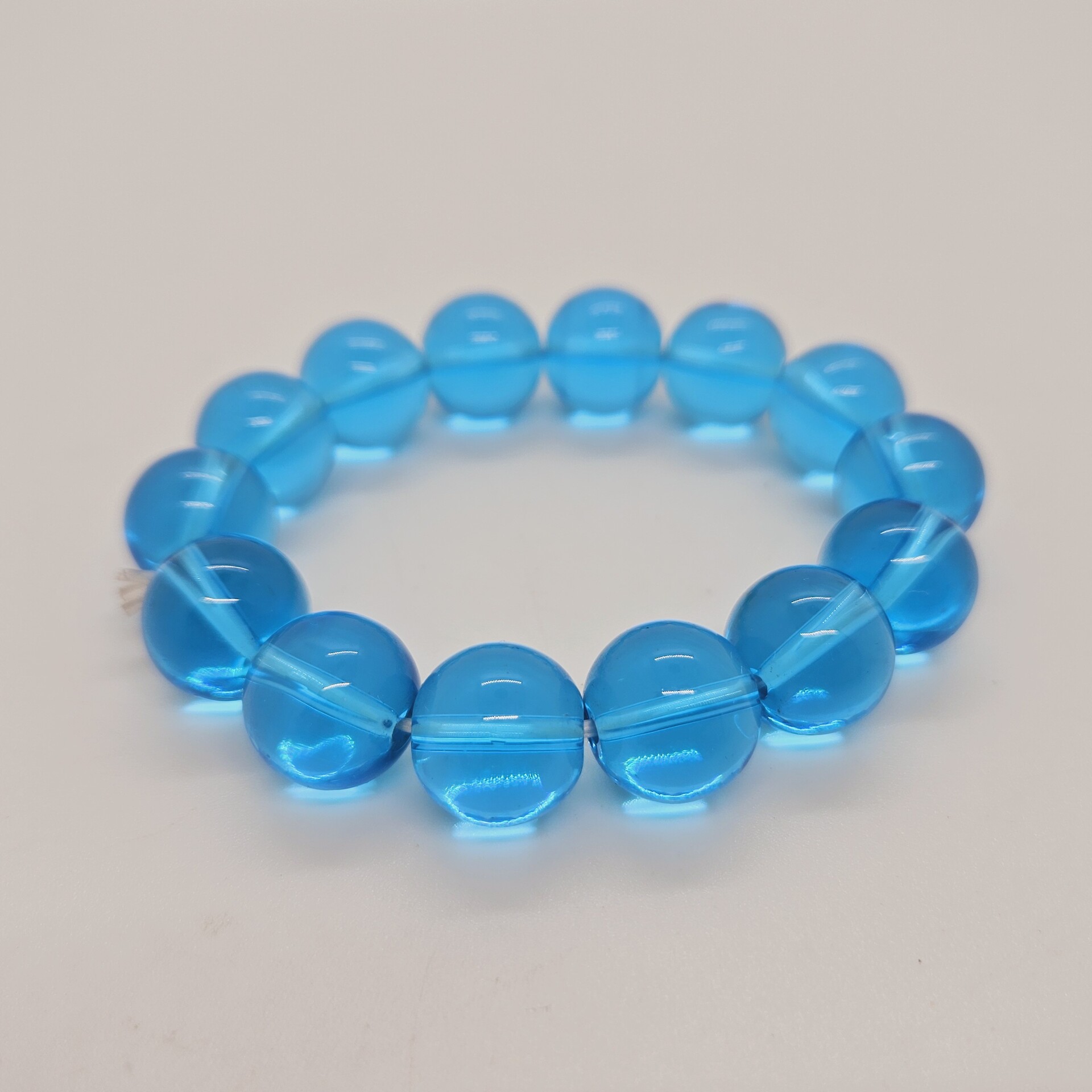 Aquamarijn kleurige armband rond