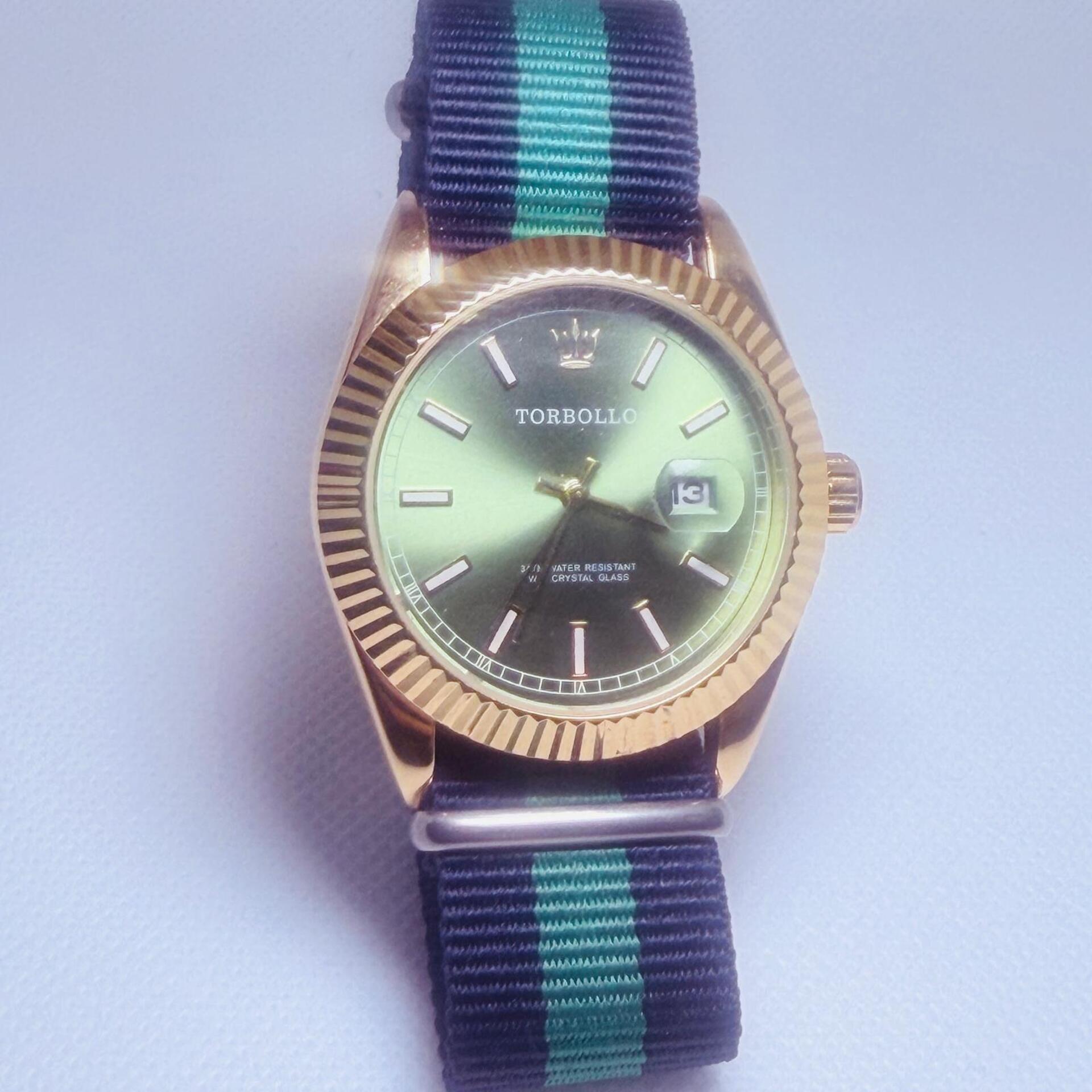 Herenhorloge Torbollo fluted bezel met natoband