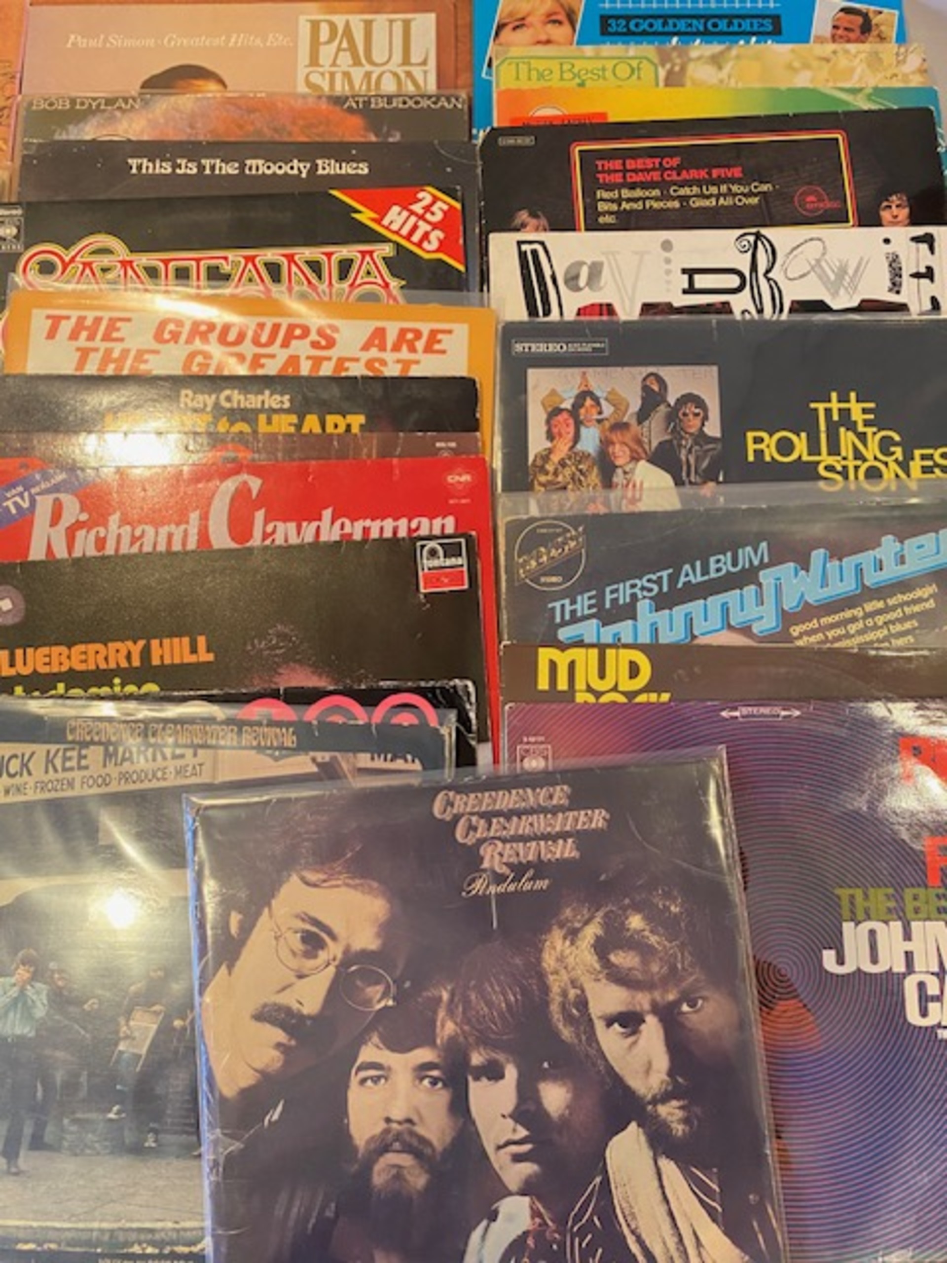 Ca. 100x Vinyl langspeelplaten , O.a. CCR, Golden Earing En Neil Diamo